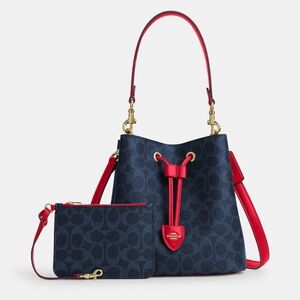 NWT coach!! Rowan Bucket Bag In Signature Canvas 💙❤️